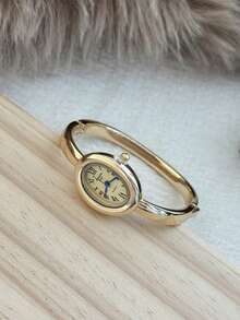1件金色手镯式女士石英表，罗马数字刻度，精致简约，适合日常佩戴，也可作为生日/毕业礼物或派对礼物。 - 金色 - 查看 2