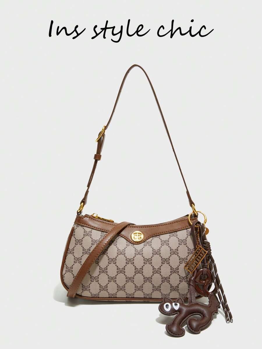 这款时尚、经典、百搭的纯色防水PU单肩包，饰有猫咪吊坠、法棍包设计和全身印花，适合购物、通勤以及各种场合，如聚会。 - 咖啡 - 查看 1