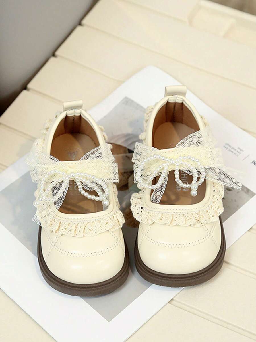 1双2026款幼儿休闲平底鞋，PU皮革拼接鞋面，柔软舒适，轻便，适合室内、室外、玩耍、节日等场合，方便的魔术贴搭扣。 - 米色 - 查看 1