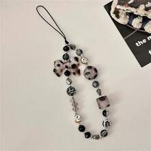 Dây đeo điện thoại thời trang được trang trí bằng nơ và hạt họa tiết da báo, thiết kế như một phụ kiện đeo cổ tay ngắn. Phụ kiện cổ điển đa năng này được thiết kế đặc biệt dành cho phụ nữ và có thể được sử dụng như một dây đeo chống thất lạc cho ốp lưng điện thoại, tương thích với Android và hầu hết các điện thoại thông minh. Món quà lý tưởng cho mẹ, gia đình, bạn bè, trẻ em, sinh nhật, ngày lễ. - xám - Xem 2