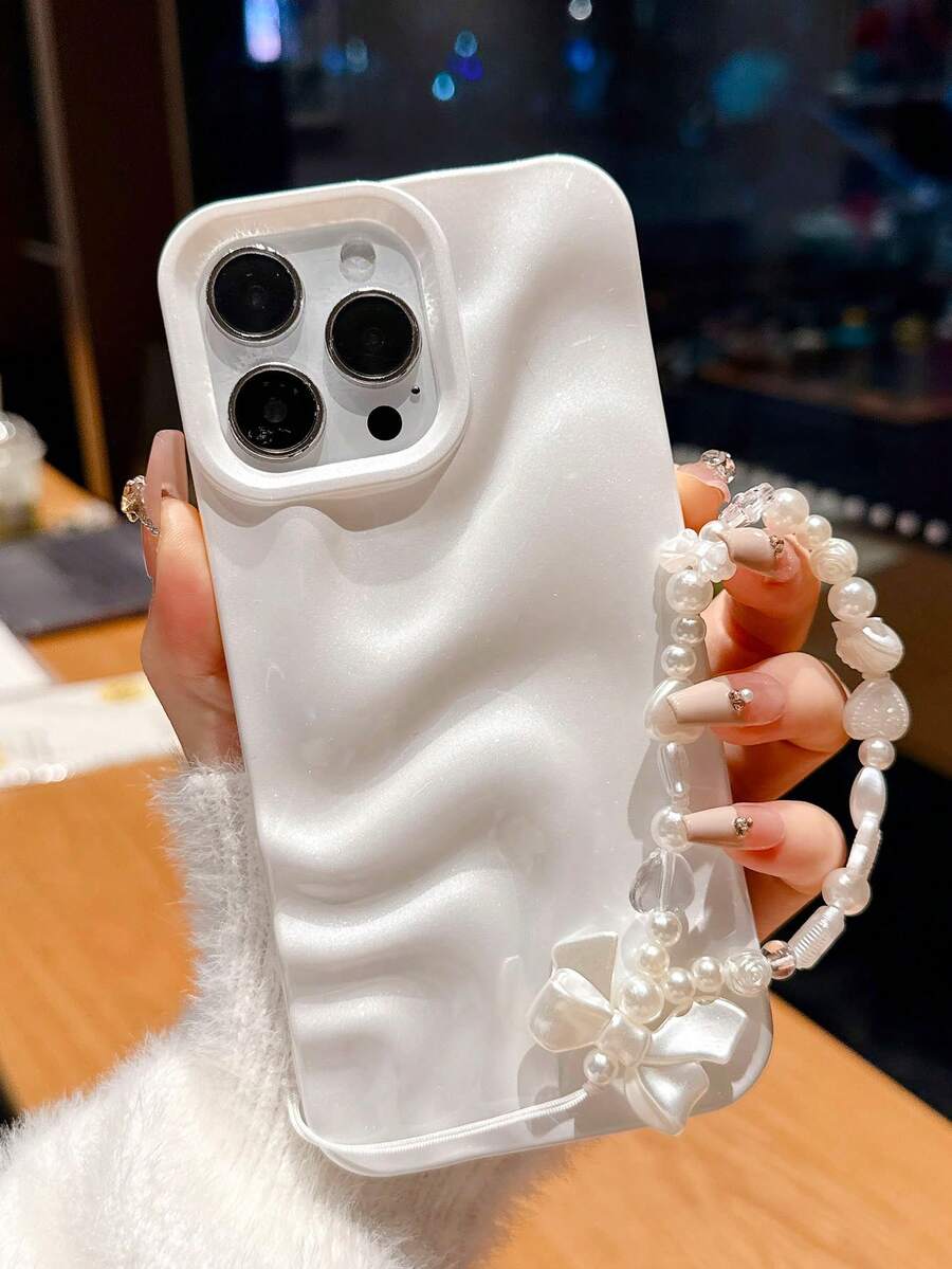 1个优雅珍珠白3D波浪纹手机壳+腕带，兼容 11、13、12、14、13 Pro Max、14 Pro Max、15、15 Pro、15 Pro Max、16、16 Pro、16 Plus、16 Pro Max、17、17 Pro、17 Air、17 Pro Max