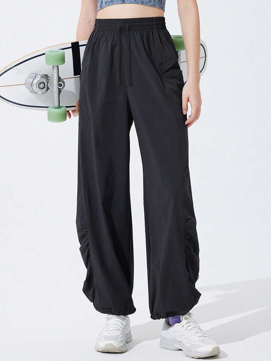 女士速干徒步裤，宽松户外裤，抽绳腰带和可调节裤脚，四向弹力尼龙面料，带大口袋，适合徒步和攀岩 - 黑色 - 查看 1