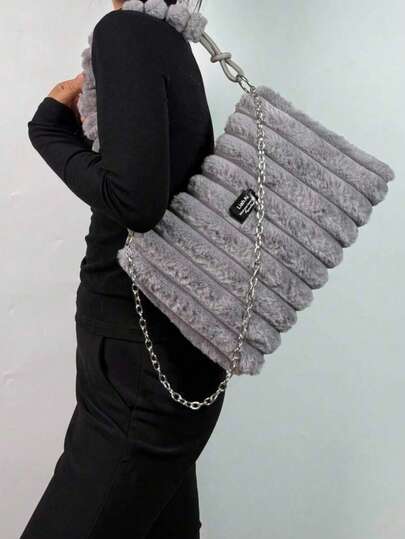 1个女士秋冬兔毛手提包，高品质拉链大容量包，可拆卸肩带，有酒红色、棕色、粉色、黑色扎染兔毛可选，适合女士和女孩，可斜挎或单肩背。