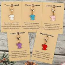 Bộ 5 móc khóa hình voi, gồm 1 chiếc/5 chiếc, có các màu trắng: xanh dương, hồng, tím, đỏ. Thiết kế dễ thương và mềm mại, kèm theo thẻ có chữ viết đồng nhất. Hình voi trên móc khóa phù hợp với những người yêu thích du lịch và tìm kiếm sự bầu bạn, có thể dùng làm móc khóa hoặc trang trí túi xách, cũng thích hợp làm quà tặng cho những người thường xuyên đi du lịch, truyền tải ý nghĩa "Luôn đồng hành trên hành trình" với hình dáng chú voi đáng yêu. - Nhiều màu - Xem 1