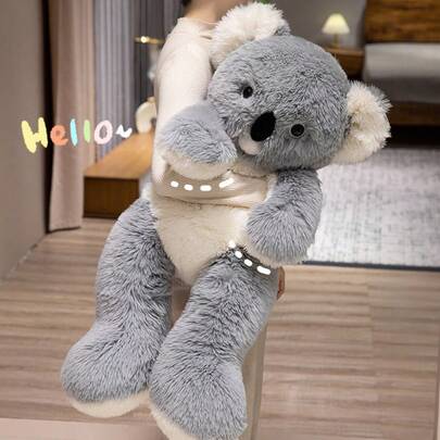 这款大型逼真的考拉造型抱枕，为任何沙发增添了趣味性和逼真感，是情人节礼物、送给男友或女友的派对礼物、送给孩子的柔软生日礼物、圣诞节礼物、感恩节礼物或其他特殊场合的理想之选。