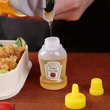 4个迷你调味挤压瓶，防漏可重复使用塑料容器，适用于番茄酱、芥末酱、蛋黄酱和沙拉酱，0.75盎司，适合午餐盒、野餐和外出用餐，番茄酱和芥末酱瓶 - 彩色 - 查看 6