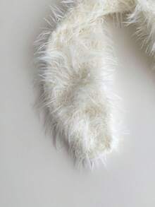 这款长耳毛绒针织帽造型别致，温暖舒适，带有护耳，柔软蓬松，是冬季的理想之选，时尚又上镜。 - 彩色 - 查看 7