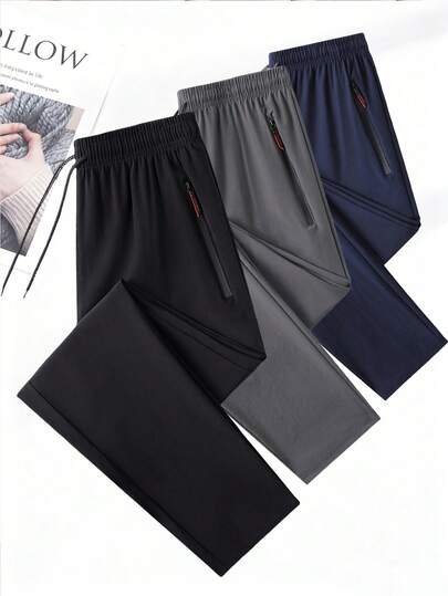 女士户外休闲运动直筒裤，轻薄透气，适合春秋季穿着，配有拉链口袋和弹性腰带，适合运动和日常穿着。