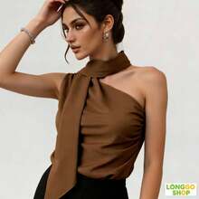 Made From Lightweight And Comfortable Linen, Perfect For The Brazilian Climate. The One-Shoulder Design With A Neck Tie Adds A Chic Touch Without Being Over The Top – Ideal For Combining Sophistication In The Office, And Also For Going Out With Friends After Work. It Easily Pairs With Trousers, Skirts Or Shorts, Making It A Versatile Piece That No Modern Woman's Wardrobe Should Be Without! - 棕色 - 查看 8