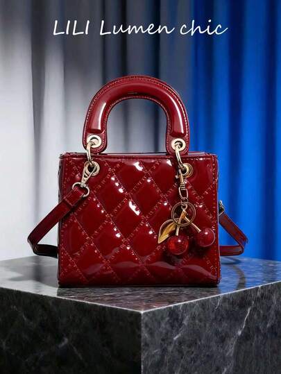 This Fashionable And Classic Solid Color Handbag Features An Elegant Zipper Design And Is Adorned With A Cherry Pendant, Making It An Ideal Choice For A Ladies' Work Bag, Business Commuter Bag, And Sophisticated Handbag. Crafted With Waterproof Material, It Can Be Carried Under The Arm And Is Suitable For Shopping, Work, Gatherings, And Dates.