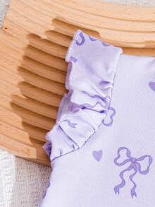 Bộ đồ 2 món cho bé gái, áo liền quần trễ vai xếp ly in hình bướm hồng dễ thương với quần short cạp cao, chất liệu mềm mại và thoáng khí, phù hợp cho bé gái mặc đi chơi hàng ngày. - Màu Lilac Tím - Xem 5