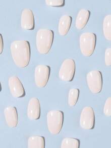 Bộ 24 miếng. Móng giả dán hình oval ngắn, màu nude bóng, tông màu kẹo Macaroon. Móng giả acrylic ôm sát móng. Bao gồm 1 tuýp keo dán và 1 dũa móng. Thích hợp cho phụ nữ và bé gái sử dụng hàng ngày trong công việc, học tập và các buổi gặp gỡ. Sản phẩm chăm sóc móng. Dụng cụ làm móng. - Màu be - Xem 4