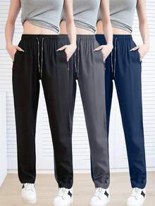 Calça feminina leve, casual, esportiva, de perna reta, com bolsos com zíper, cintura elástica, ideal para exercícios e uso diário, primavera/outono (1 peça). - Preto - Ver 7