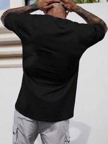 Camiseta de Hombre Manfinity Homme de Corte Holgado con Letra en Relieve - Negro - Ver 2