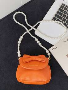 1个女童蝴蝶结PU磁扣简约珍珠链条斜挎包，适合日常四季使用 - A - 查看 10