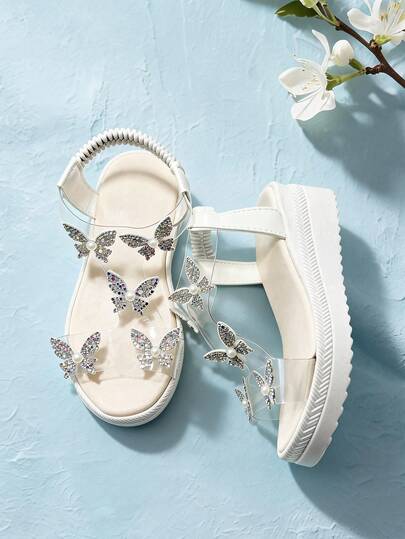 1 par de sandalias de moda para niños, sandalias de suela gruesa antideslizante para niñas, diseño de slip-on, estilo princesa, correa transparente con decoración de mariposa de cristal y perla, adecuado para uso diario de verano, casual, fiesta, boda, sandalias de niños de punta abierta