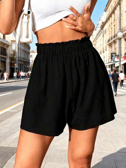 女士休闲宽松纯色荷叶边腰部运动短裤，适合日常休闲、户外健身、跑步、骑行，春夏季穿着。