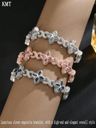 KMT 男士镶钻彩色眼睛无限符号手链，爪镶镀金嘻哈风格饰品。四叶草元素象征好运，整体设计寓意着多多好运。