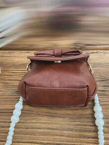 1个女童蝴蝶结PU磁扣简约珍珠链条斜挎包，适合日常四季使用 - A - 查看 7