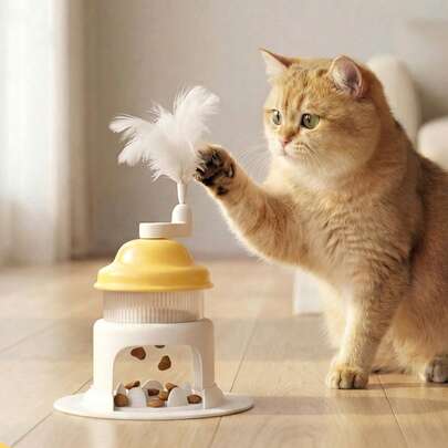 1个宠物益智喂食器玩具，3种颜色可选，旋转式出食器，顶部羽毛带铃铛，可逗猫狗开心，适合宠物自主玩耍，不含电池
