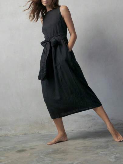 Plus Size Women's Minimalist Solid Color Linen Dress, Spaghetti Strap Design For Cooling Comfort, Pleated Waist For Slimming Effect, A-Line Hem To Flatter Various Figures. Suitable For Women Pursuing Natural And Quality Lifestyle. Elegant Black Summer
