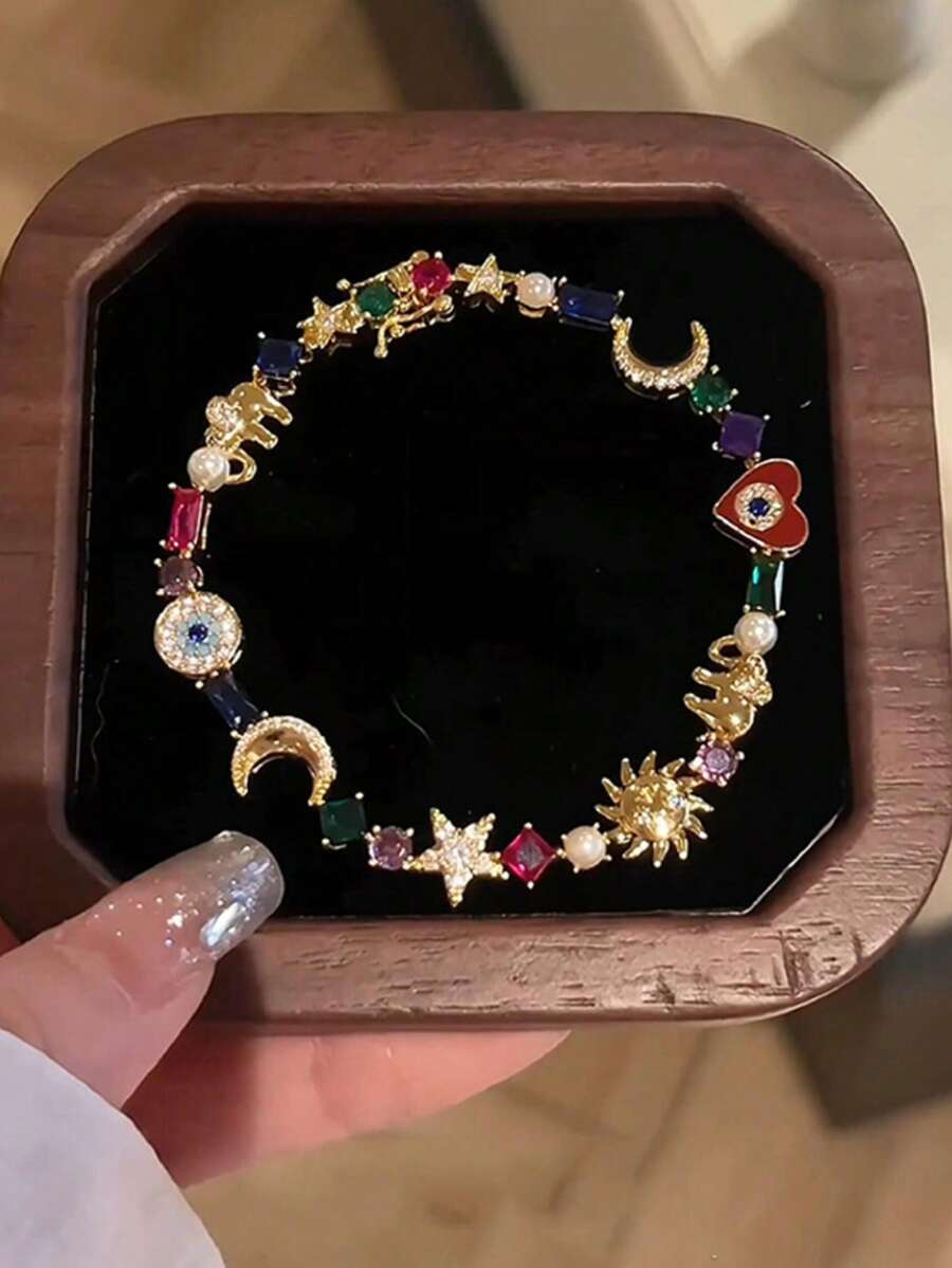 rundraw 一款饰有星星、月亮和闪亮珐琅心形的手镯；热门出口珠宝。 - 彩色 - 查看 1