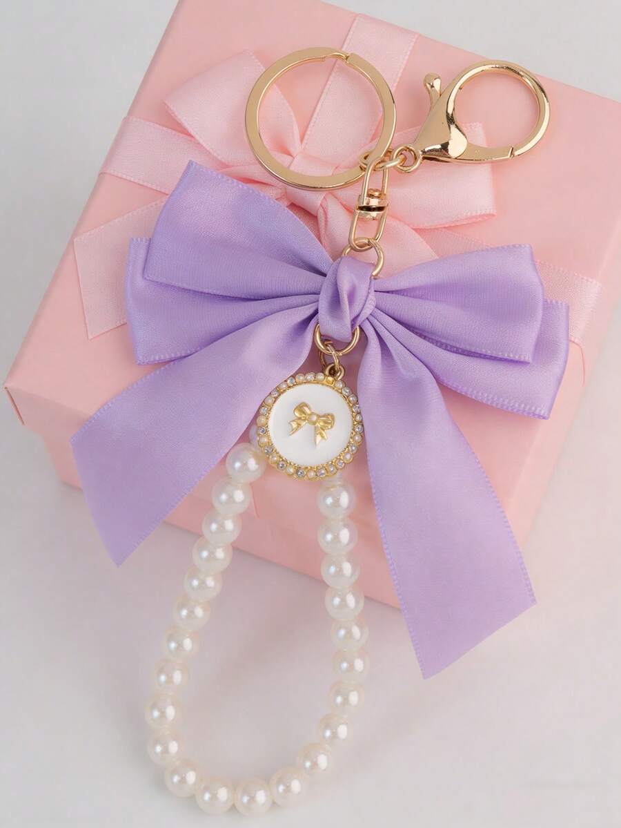 1 Stück Schlüsselanhänger & Handyschnur mit Schleife - Mode Taschenbaumler, süßer Perlenanhänger, geeignet für Frauen, ideales Geschenk für Geburtstag/Valentinstag/Weihnachten, modischer Schlüsselring für Taschen, Autos und Handys, und süße Accessoires, entworfen für Mädchen - Violett - Übersicht 1