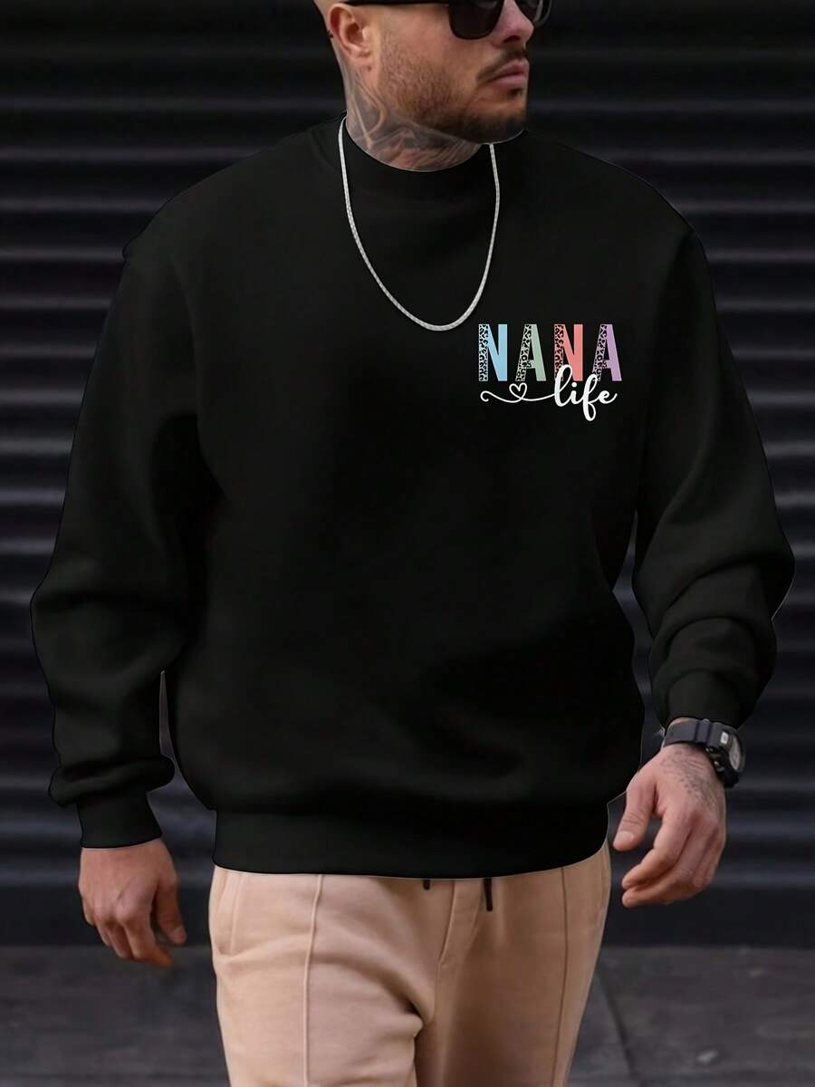 Casual Crew Neck Black Sweatshirt With Multicolor "NANA Life" Text, Silver Chain Necklace, Beige Pants - Stylish Men's Daily Wear Outfit With Confident Stance, Perfect For Streetwear & Everyday Looks - 黑色 - 查看 1