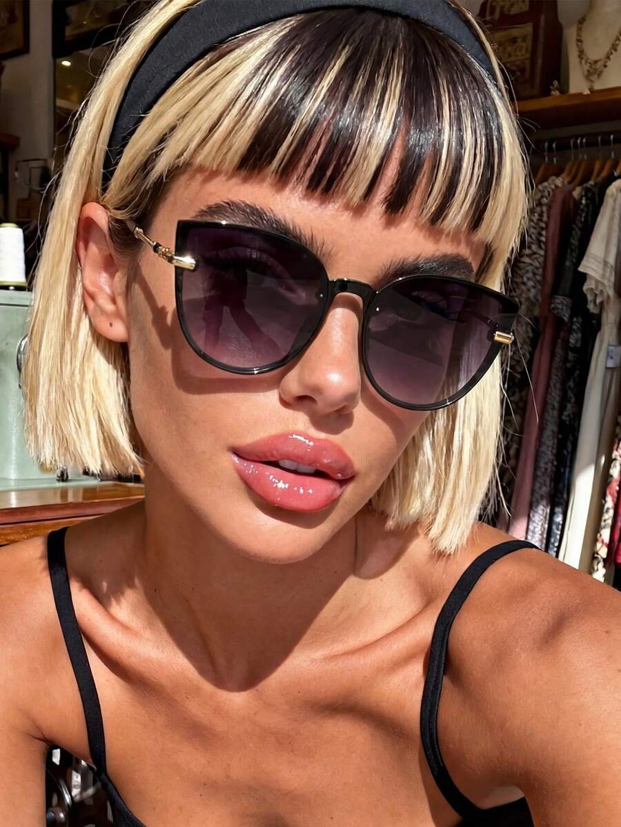 一副男女通用的猫眼形极简太阳镜，适合家庭出游、旅行、运动、海滩、电子音乐节、度假装扮、夏季配饰、驾驶、度假、高尔夫、徒步旅行、街头风、户外穿着、营造度假氛围、搭配优雅服饰、街头风配饰、运动、派对、钓鱼、户外活动 - 黑金雙灰 - 查看 1