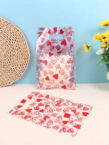 50个透明塑料礼品袋，印有甜心和“爱”字图案，开口手提袋，适用于情人节、婚礼、派对礼品包装 - 紅色 - 查看 1