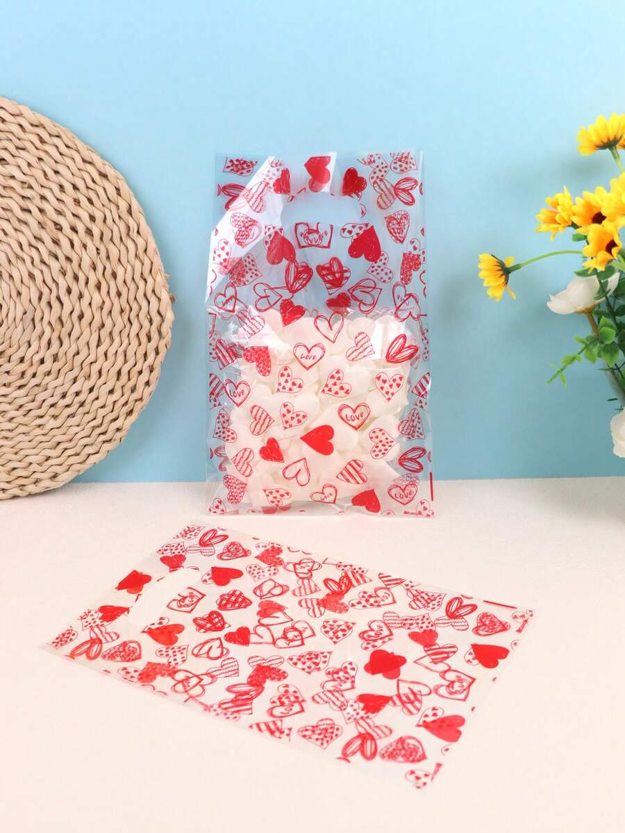 50个透明塑料礼品袋，印有甜心和“爱”字图案，开口手提袋，适用于情人节、婚礼、派对礼品包装 - 紅色 - 查看 1