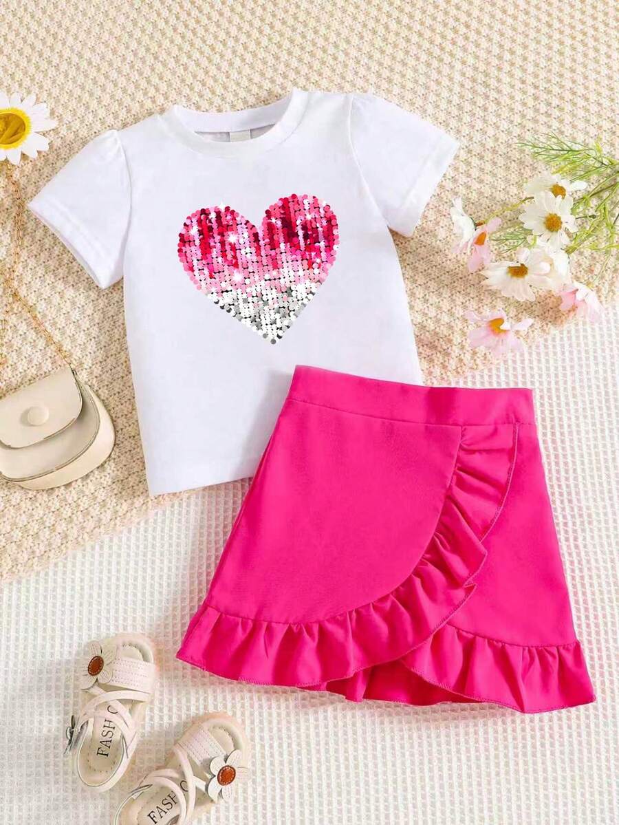 Bộ áo thun ngắn tay in hình trái tim và chân váy xếp ly cho bé gái, thích hợp mặc mùa hè. - Màu Hồng Tươi - Xem 1