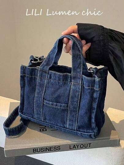 Denna nya, snygga och klassiska fyrkantiga tygväska har dubbla handtag och denimdetaljer. Perfekt för utomhusaktiviteter, pendling, shopping, campusliv och korta resor.