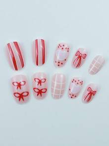 24pcs Valentine's Day Nail Art Set: Oval Shaped Press-On Nail Stickers In Red & Pink Heart, Grid, Bow, Heart Polka Dot, Stripe Patterns. Acrylic Press-On Nail Stickers Suitable For Short Nails, Can Be Used For Acrylic Nails, Red Nails, Pink Nails, Ideal For Nail Decoration. Suitable For Women's Dates, Parties, Enhancing Personal Charm! - View 3