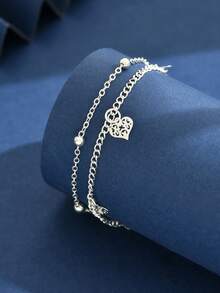 Modischer und eleganter bohemian-Stil Doppelschicht Perlen Fußkette, mit Cut Out Herz Design, geeignet für den täglichen Gebrauch, Urlaub, auch als Valentinstag oder Geburtstagsgeschenk. (Das Muster auf dem herzförmigen Anhänger ist zufällig.) (Die Anzahl der Perlen an der Fußkette ist nicht fest) - Silber - Übersicht 4