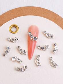 合金美甲饰品，10件套，简约可爱，百搭风格。单件法式水钻美甲饰品，可搭配小配件进行DIY。女士美甲饰品，美容配件，适合日常生活、节日和通勤等场合的DIY使用。美甲用品 - 彩色 - 查看 7