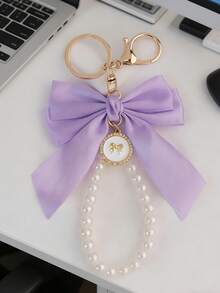 1 Stück Schlüsselanhänger & Handyschnur mit Schleife - Mode Taschenbaumler, süßer Perlenanhänger, geeignet für Frauen, ideales Geschenk für Geburtstag/Valentinstag/Weihnachten, modischer Schlüsselring für Taschen, Autos und Handys, und süße Accessoires, entworfen für Mädchen - Violett - Übersicht 2
