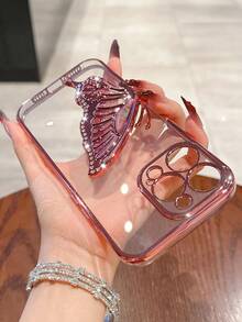这款奢华电镀透明手机壳配有蝴蝶流沙闪粉支架，闪耀夺目。采用硅胶材质，提供防震防摔保护。兼容 16/16e/16 Pro/16 Pro Max/16 Plus/15/14/13/12/11/X/XS/XR/8/7、Galaxy S25/S24/S23/S22/S21/A55/A54/A53/A52/A35/A34/A23/A16/A15/A14/A13/A12/A05S/FE/Ultra/4G/5G，以及 Redmi/Honor/MOTO/OPPO/Infinix 等其他型号手机。 - 粉色 - 查看 6