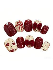 10pcs Pure Handmade Press On Nails Short Nails Oval Nails The Wine Red And Champagne Gold Have A Striking Base Color. The Bright Wine Red Surface Is Decorated With Pearls, While The Champagne Features Hand-Painted Bow Ribbons, Hearts And Polka Dots, As Well As A Three-Dimensional Plush Bow Decoration.