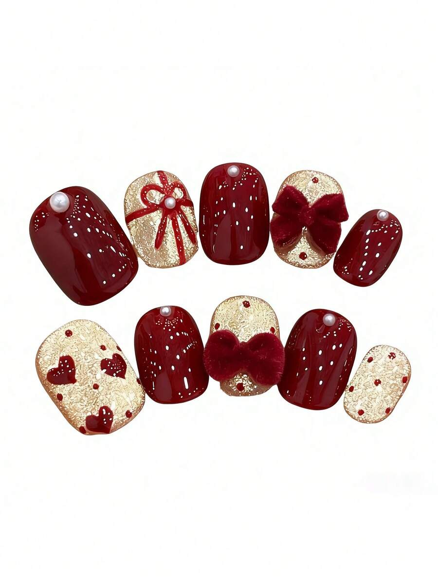 10pcs Pure Handmade Press On Nails Short Nails Oval Nails The Wine Red And Champagne Gold Have A Striking Base Color. The Bright Wine Red Surface Is Decorated With Pearls, While The Champagne Features Hand-Painted Bow Ribbons, Hearts And Polka Dots, As Well As A Three-Dimensional Plush Bow Decoration.