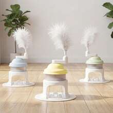 1个宠物益智喂食器玩具，3种颜色可选，旋转式出食器，顶部羽毛带铃铛，可逗猫狗开心，适合宠物自主玩耍，不含电池 - 彩色 - 查看 2