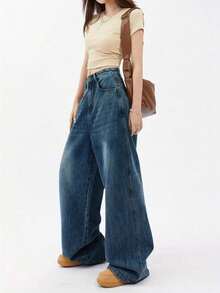 Quần jeans nữ ống rộng xếp ly cạp trung, màu xanh đậm, chất liệu denim bạc màu, thiết kế xếp ly ở eo, cúc kim loại, kiểu dáng vintage năm 2026. - Rửa tối - Xem 5