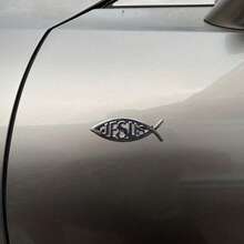 3D Metallic Jesus Fish Car Emblem - Popular Religious Car Sticker For Vehicle Decoration. High-Quality Zinc Alloy Jesus Fish Car Decal With 3D Stereoscopic Design, Visually Striking. As A Classic Christian Fish Symbol, It Perfectly Expresses Faith While Adding Personalized Charm To Your Car. Suitable For Car Body, Windows And Doors, Easy To Install Without Damaging Paint Or Leaving Adhesive Residue. - A - View 1