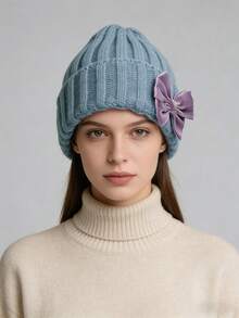 2025 女士冬季针织帽 - 柔软保暖的腈纶羊毛混纺罗纹针织帽，饰有优雅的紫色天鹅绒蝴蝶结，是秋冬休闲和通勤装扮的时尚必备单品，均码适合大多数成年人，有浅蓝色/橙色/粉色可选，适合寒冷天气和叠穿。 - 彩色 - 查看 17