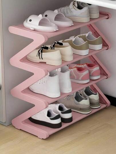 This 4-Tier Large Z-Shaped Shoe Rack Can Be Easily Assembled Without Tools. Made Of Pink Plastic Material, It Is A Stackable Storage Rack Suitable For Home, Dorm, And Living Room. Its Space-Saving Freestanding Design Makes It An Ideal Choice For Shoe Storage.