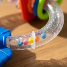 TendenciaMordedera Sensorial Giratoria Gentle Steps Spin & ShakeCalidad premium