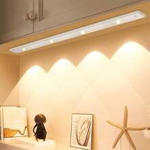 Yogle Tira de luz con sensor de movimiento LED moderna, barra de luz magnética inalámbrica recargable para gabinetes, armarios, armarios - Patrón de camuflaje montañoso, sin necesidad de cableado, carga USB, material de plástico, acabado mate, control de botón, regulable, iluminación LED, decoración del hogar, iluminación inteligente, estilo minimalista, diseño de moda, iluminación de alta calidad, decoración del hogar - Negro - Ver 18