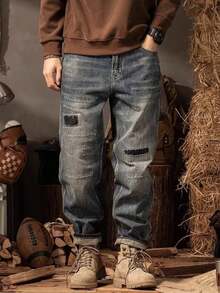 Pantalones Vaqueros Vintage con Corte Recto Relajado, Remiendos Estratégicos, Lavado Suave y Estética Streetwear que Combina Comodidad, Durabilidad y Estilo Cotidiano - Gris - Ver 1