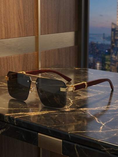 一副无框多边形时尚眼镜，无框黑灰色镜片，木纹镜腿配金色金属装饰，轻盈奢华商务休闲男士眼镜