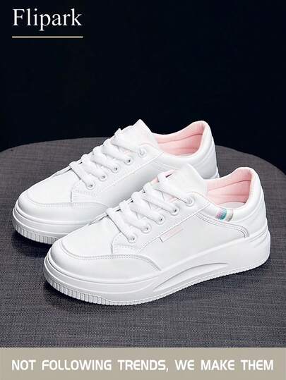Flipark 1 双休闲运动白鞋，百搭轻便，适合学生外出穿着。